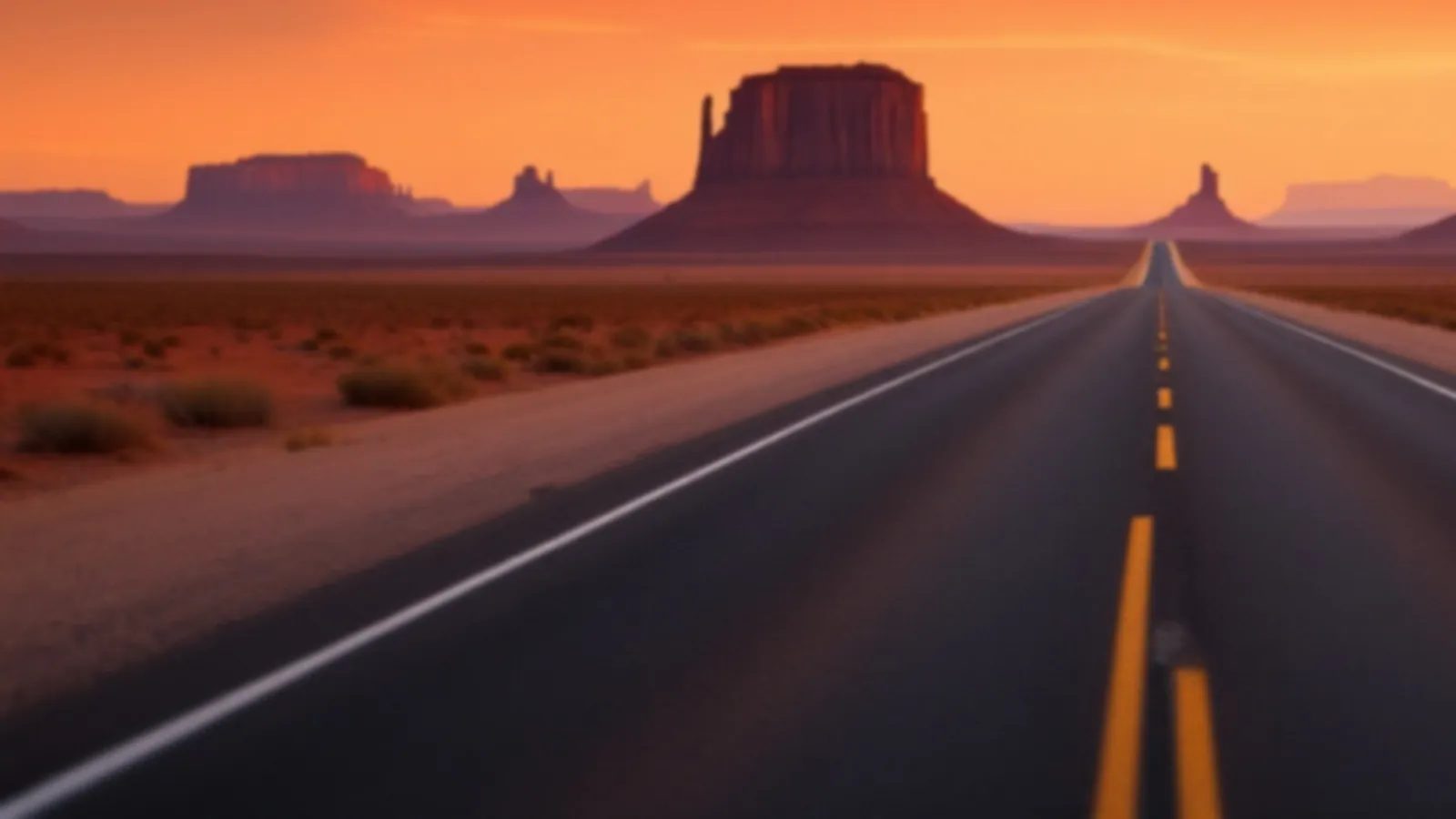 An empty desert highway at sunrise running straight to distant red mesas, the PistonFinance view of personal loans online, $100 – $5,000